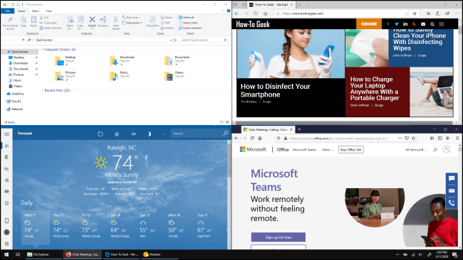 Quatre fenêtres, chacune remplissant un quart de l'écran dans Windows 10,