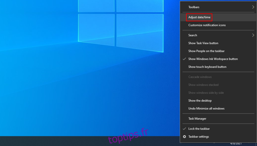 Windows 10 montre comment ajuster les paramètres de date et d'heure à partir de la barre d'état système